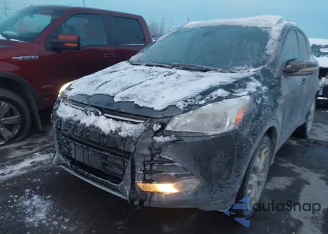 2015 Ford Escape Titanium z USA, uszkodzony, nr VIN 1FMCU9J9XFUB17388